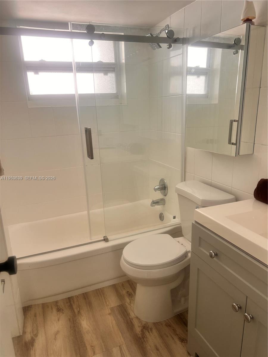 1300 Lincoln Road, Unit B902 Miami Beach, FL 33139 - Photo 12 of 17 a bathroom with a toilet and a shower