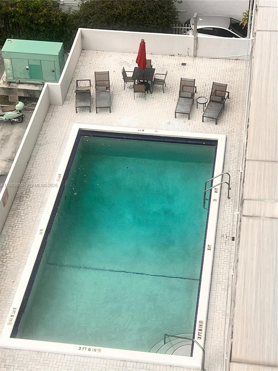 1300 Lincoln Road, Unit B902 Miami Beach, FL 33139 - Photo 17 of 17 a view of swimming pool from a balcony
