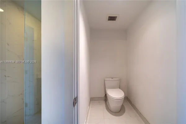 a bathroom with a toilet