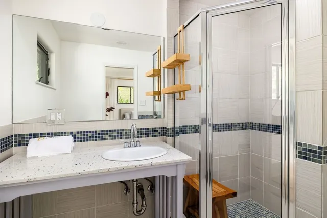 a bathroom with a sink and a mirror