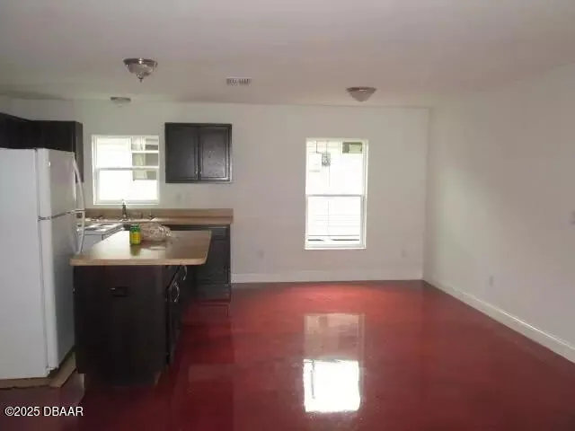 a bathroom with a sink a mirror and a bathtub