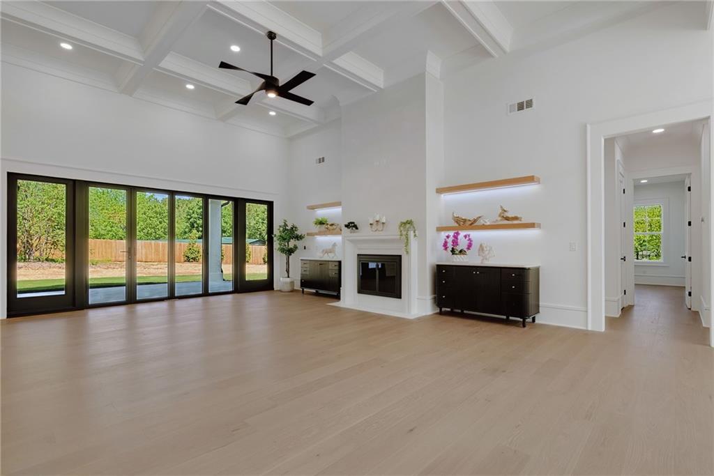 2366 Wall Road Monroe, GA 30656 - Photo 105 of 186 a view of an empty room with a fireplace and a window