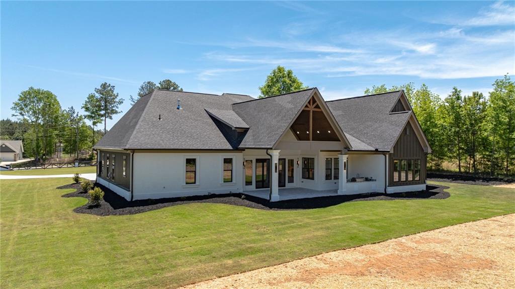 2366 Wall Road Monroe, GA 30656 - Photo 64 of 186 an aerial view of a house with a garden
