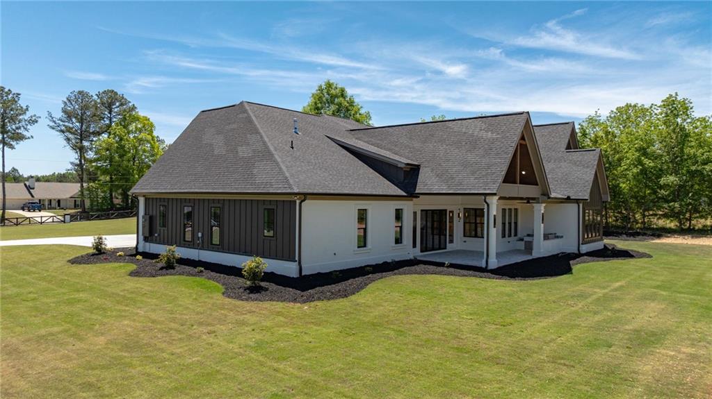 2366 Wall Road Monroe, GA 30656 - Photo 65 of 186 front view of a house with a yard