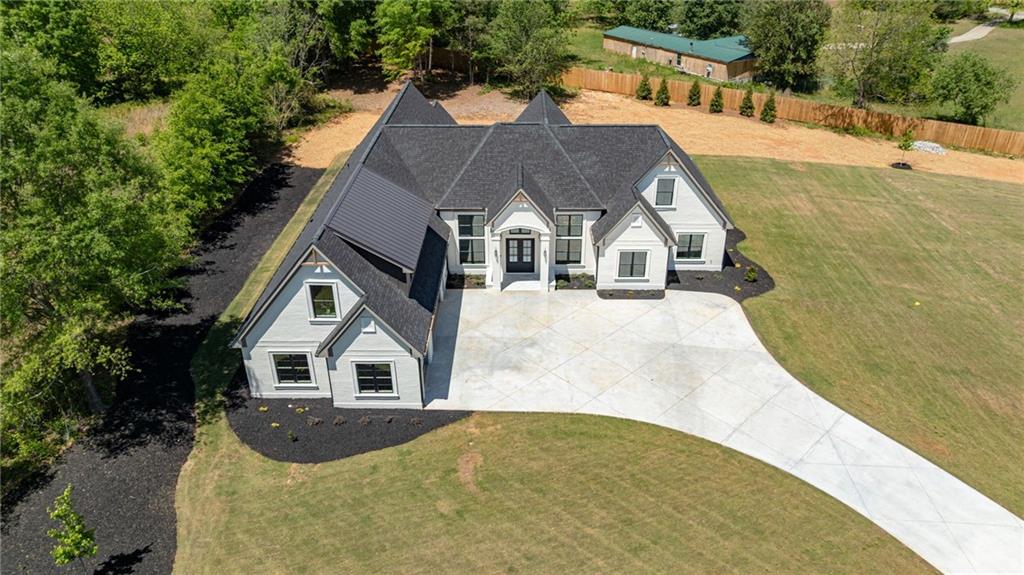 2366 Wall Road Monroe, GA 30656 - Photo 69 of 186 a front view of a house with a yard