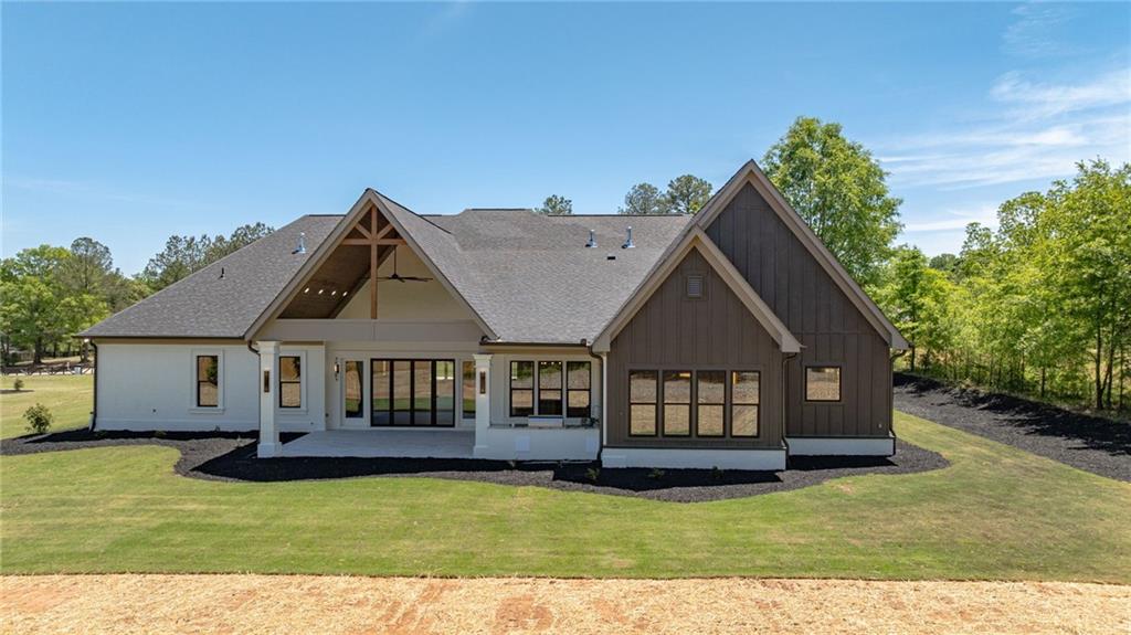 2366 Wall Road Monroe, GA 30656 - Photo 82 of 186 a view of a house with a yard and sitting area