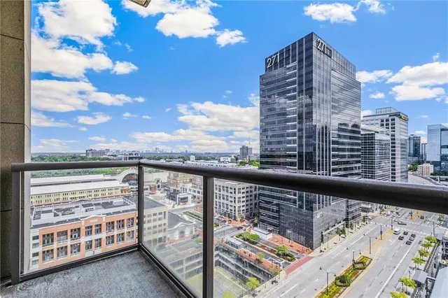 a view of a balcony with city view
