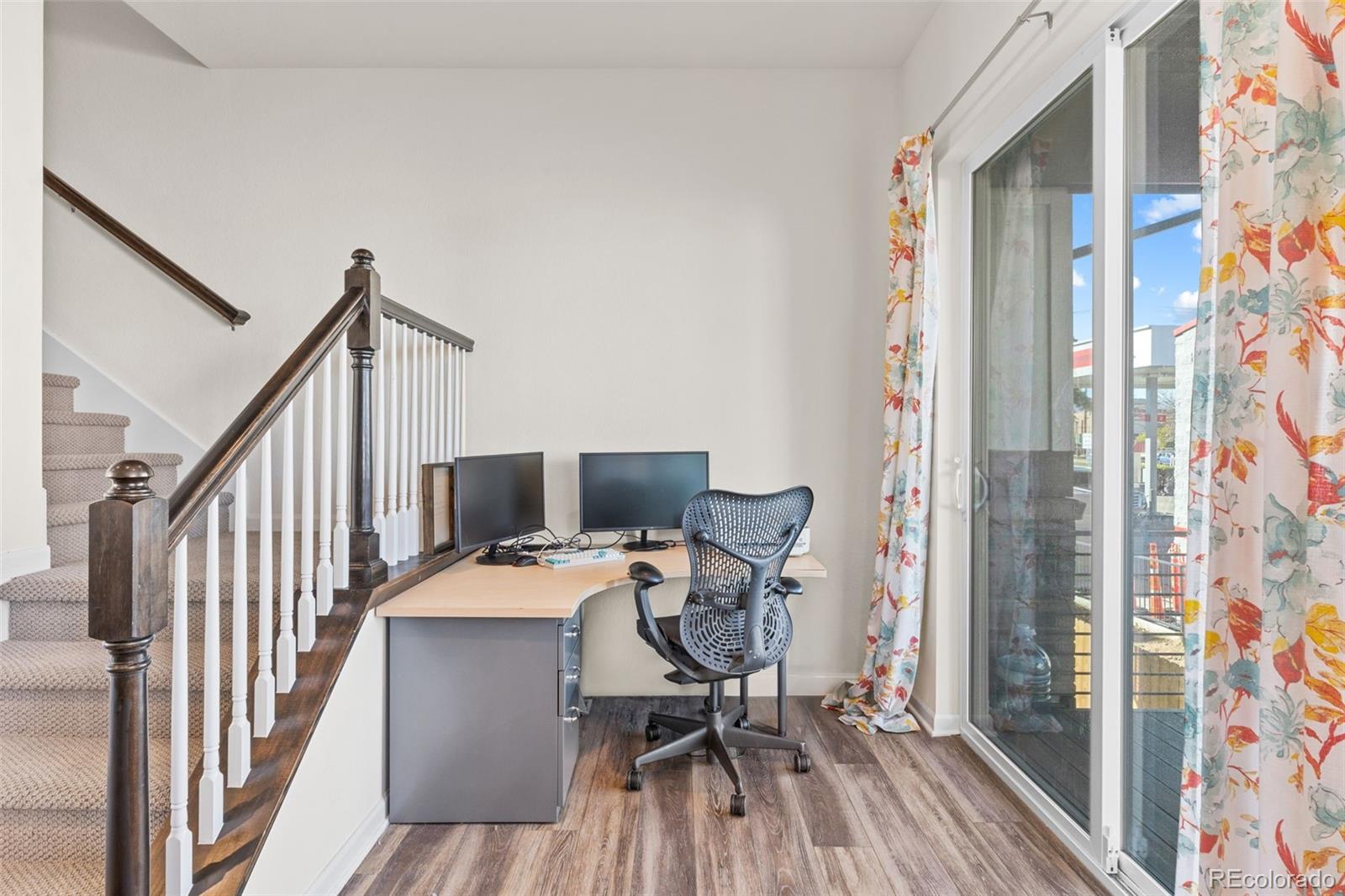 5173 Vivian Street Wheat Ridge, CO 80033 - Photo 19 of 31 a workspace with furniture and wooden floor