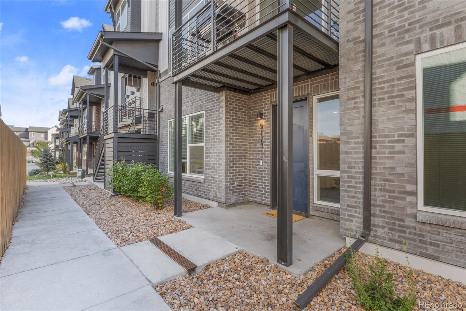 5173 Vivian Street Wheat Ridge, CO 80033 - Photo 3 of 31 a view of a entrance gate of the house