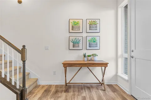 a view of walk in closet with clothes