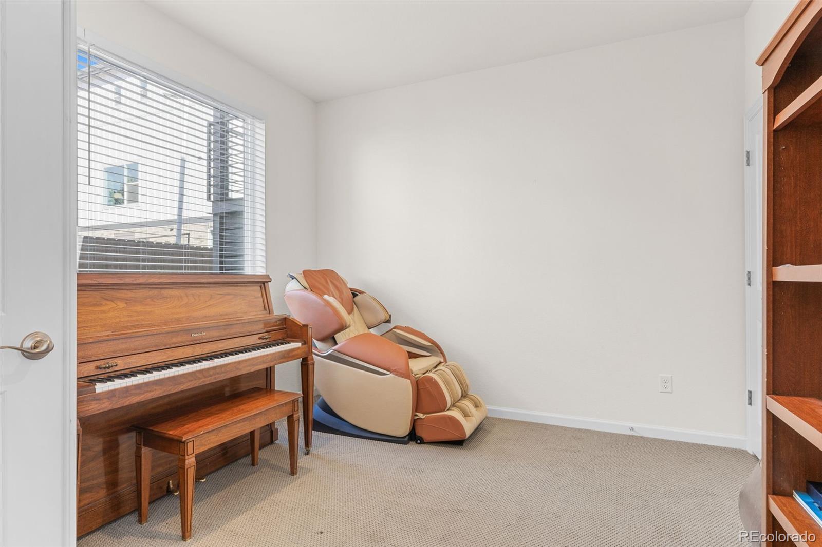 5173 Vivian Street Wheat Ridge, CO 80033 - Photo 10 of 31 a room with a bed and a window