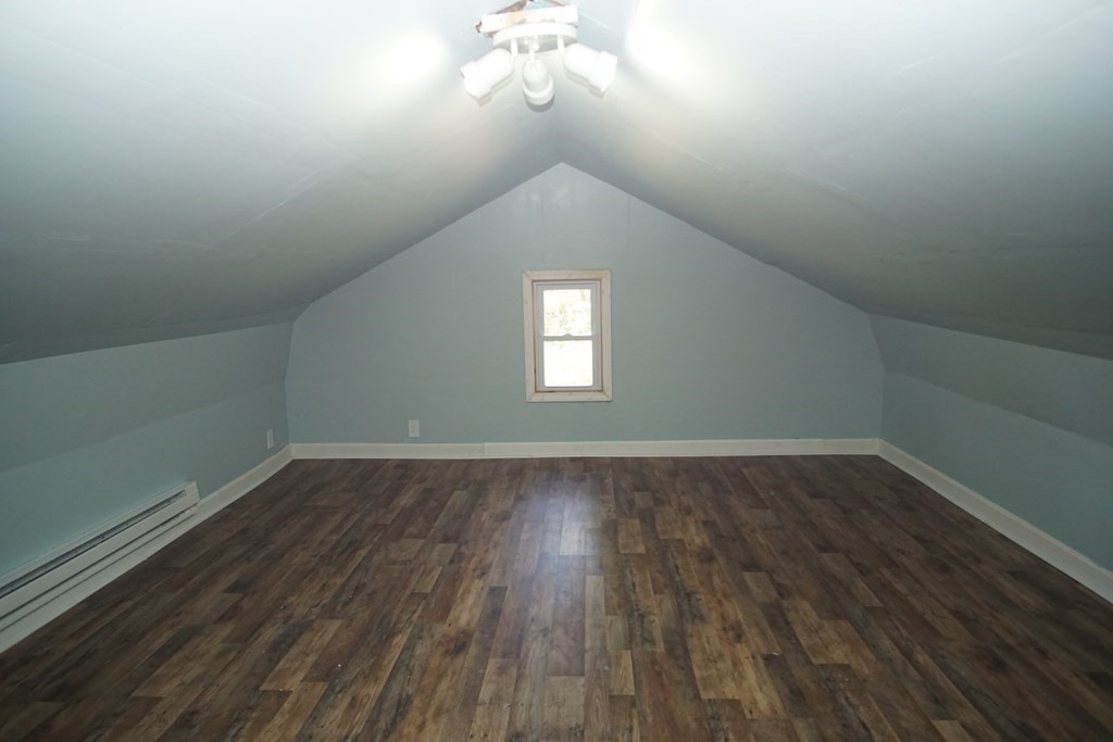 40 Marble Road Sutton, MA 01590 - Photo 11 of 16 a view of a room with wooden floors and window