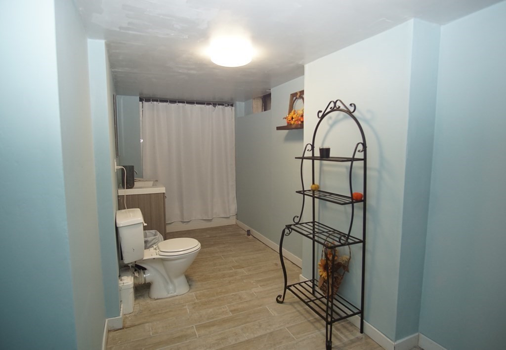 40 Marble Road Sutton, MA 01590 - Photo 14 of 16 a bathroom with a sink toilet and a mirror