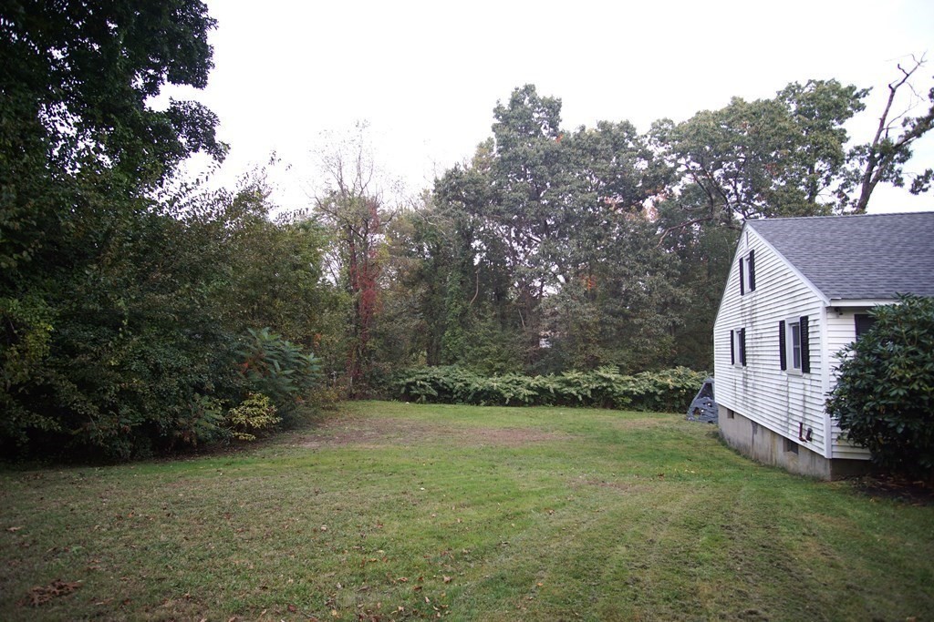 40 Marble Road Sutton, MA 01590 - Photo 15 of 16 a view of a backyard with garden