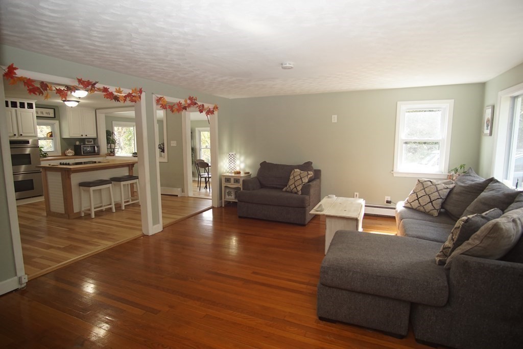 40 Marble Road Sutton, MA 01590 - Photo 4 of 16 a living room with furniture and wooden floor