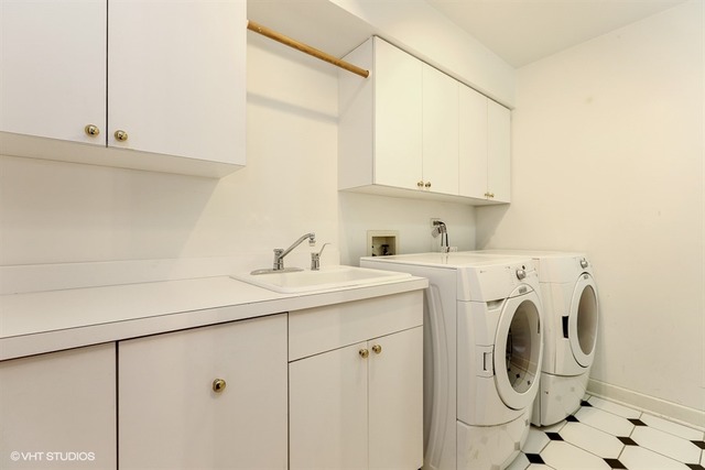 6040 South Grant Street Burr Ridge, IL 60527 - Photo 18 of 25 a utility room with dryer and washer