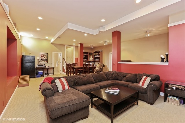 6040 South Grant Street Burr Ridge, IL 60527 - Photo 20 of 25 a living room with furniture and a couch