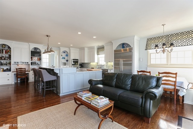 6040 South Grant Street Burr Ridge, IL 60527 - Photo 4 of 25 a living room with furniture kitchen view and a wooden floor