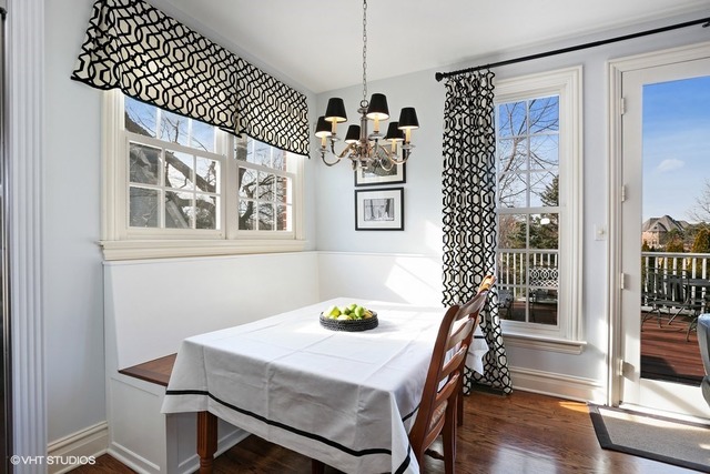 6040 South Grant Street Burr Ridge, IL 60527 - Photo 6 of 25 a dining room with furniture and window