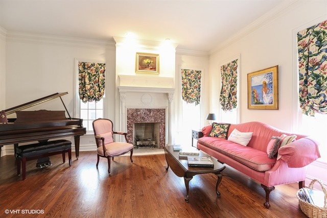 6040 South Grant Street Burr Ridge, IL 60527 - Photo 9 of 25 a living room with furniture fireplace and wooden floor