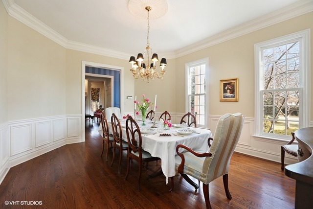 6040 South Grant Street Burr Ridge, IL 60527 - Photo 10 of 25 a view of a dining room with furniture window and wooden floor