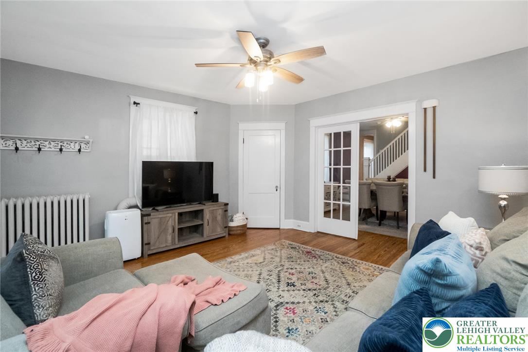 1209 Maple Street Bethlehem, PA 18018 - Photo 13 of 46 a living room with furniture and a flat screen tv