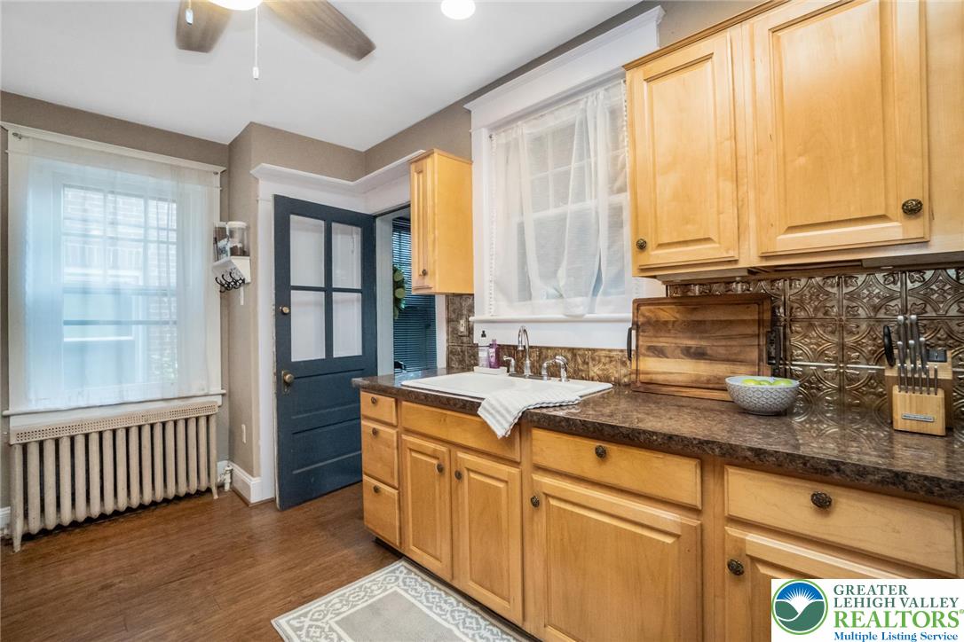 1209 Maple Street Bethlehem, PA 18018 - Photo 19 of 46 a kitchen with sink window and cabinets