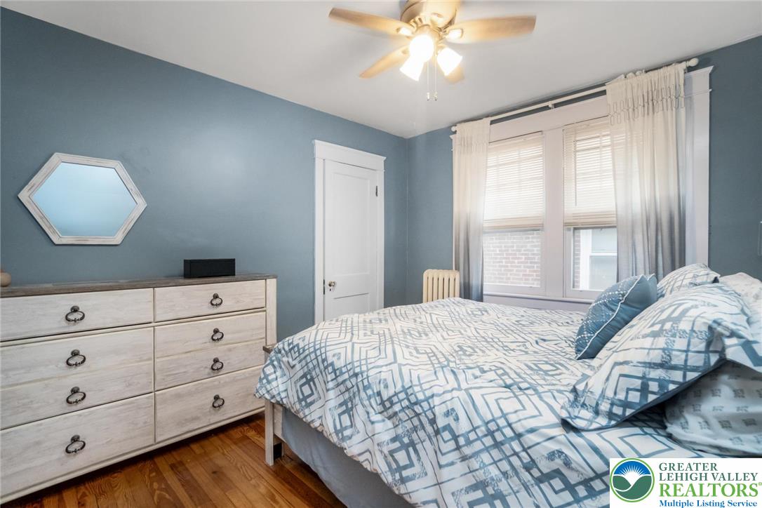 1209 Maple Street Bethlehem, PA 18018 - Photo 23 of 46 a bedroom with a bed and a mirror on dresser