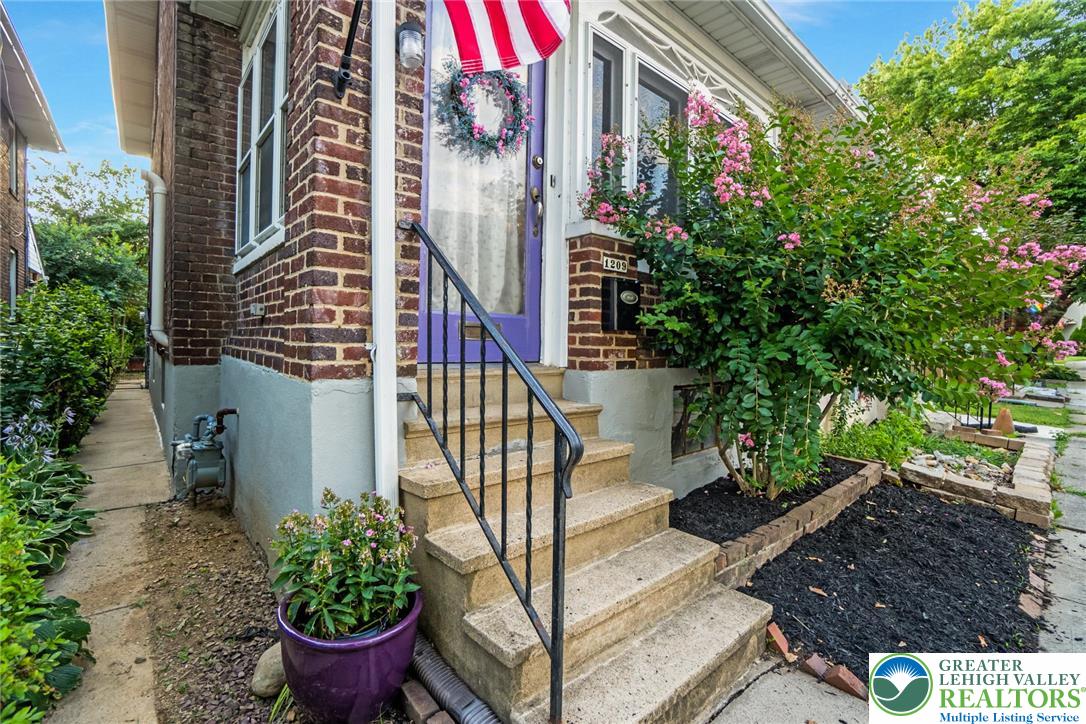 1209 Maple Street Bethlehem, PA 18018 - Photo 3 of 46 a view of a house with a yard and potted plants