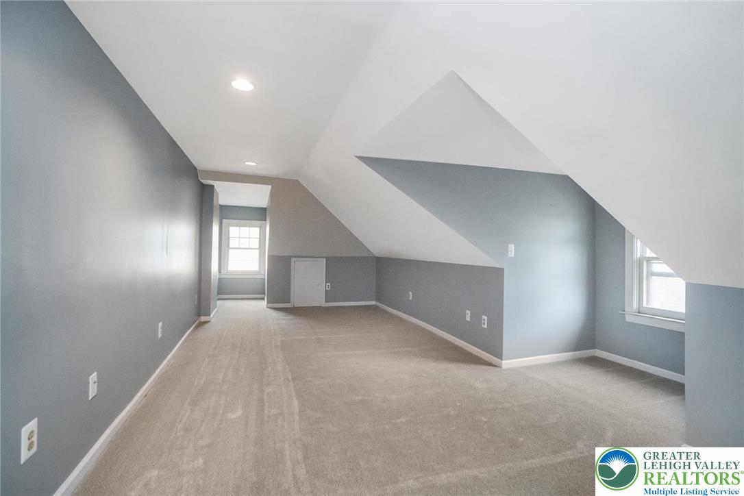 1209 Maple Street Bethlehem, PA 18018 - Photo 32 of 46 a view of an empty room and window and fire place