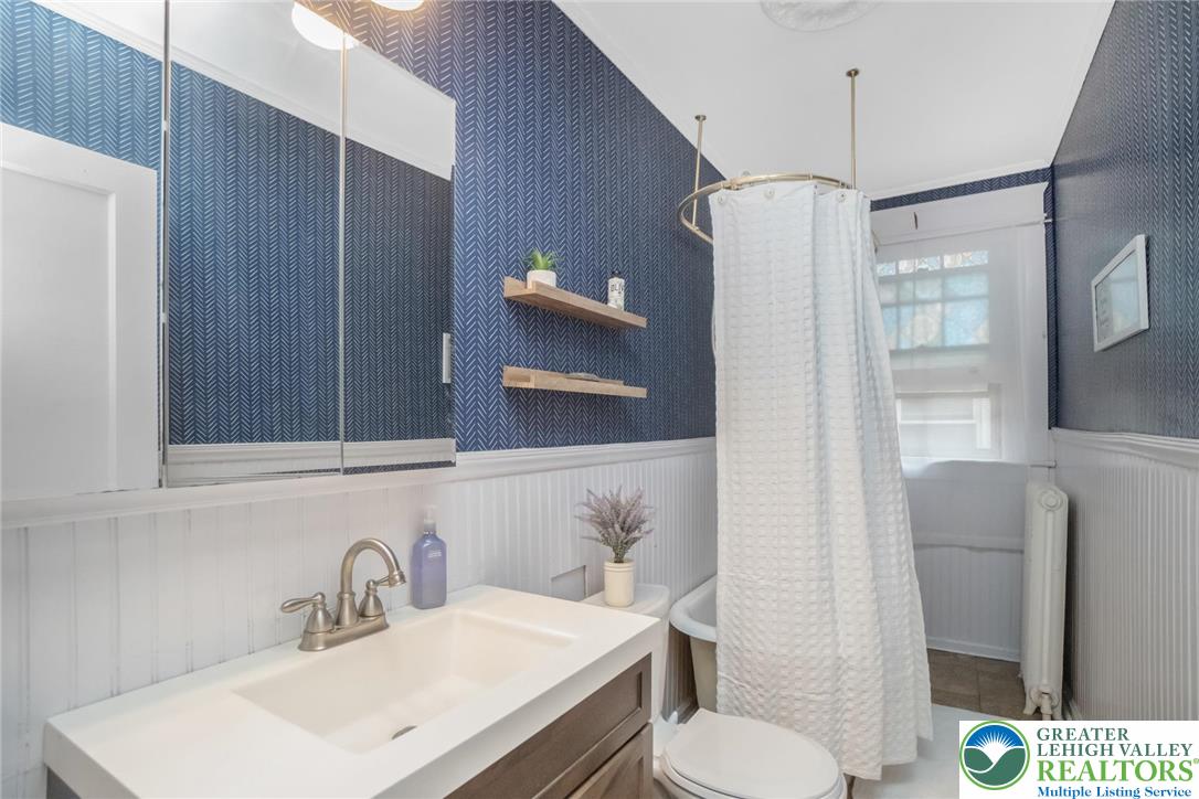 1209 Maple Street Bethlehem, PA 18018 - Photo 35 of 46 a bathroom with a sink toilet and shower