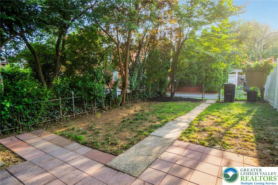 1209 Maple Street Bethlehem, PA 18018 - Photo 45 of 46 a view of a backyard with large trees