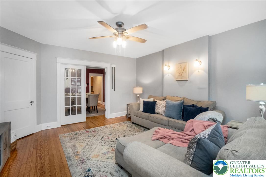 1209 Maple Street Bethlehem, PA 18018 - Photo 10 of 46 a living room with furniture and a wooden floor