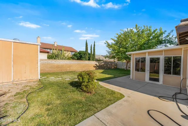 a house view with a garden space