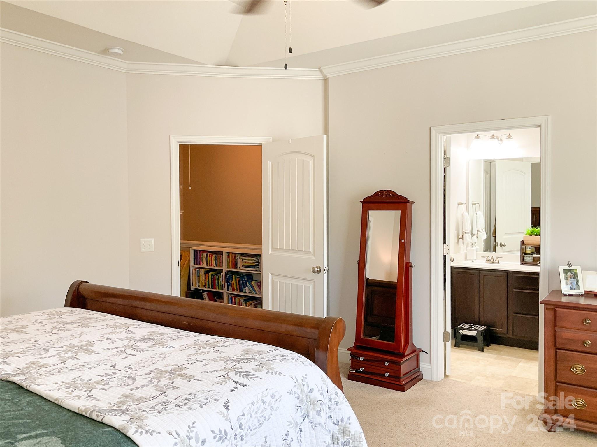 349 Intrepid Court Greer, SC 29650 - Photo 17 of 31 a bedroom with a bed and a dresser