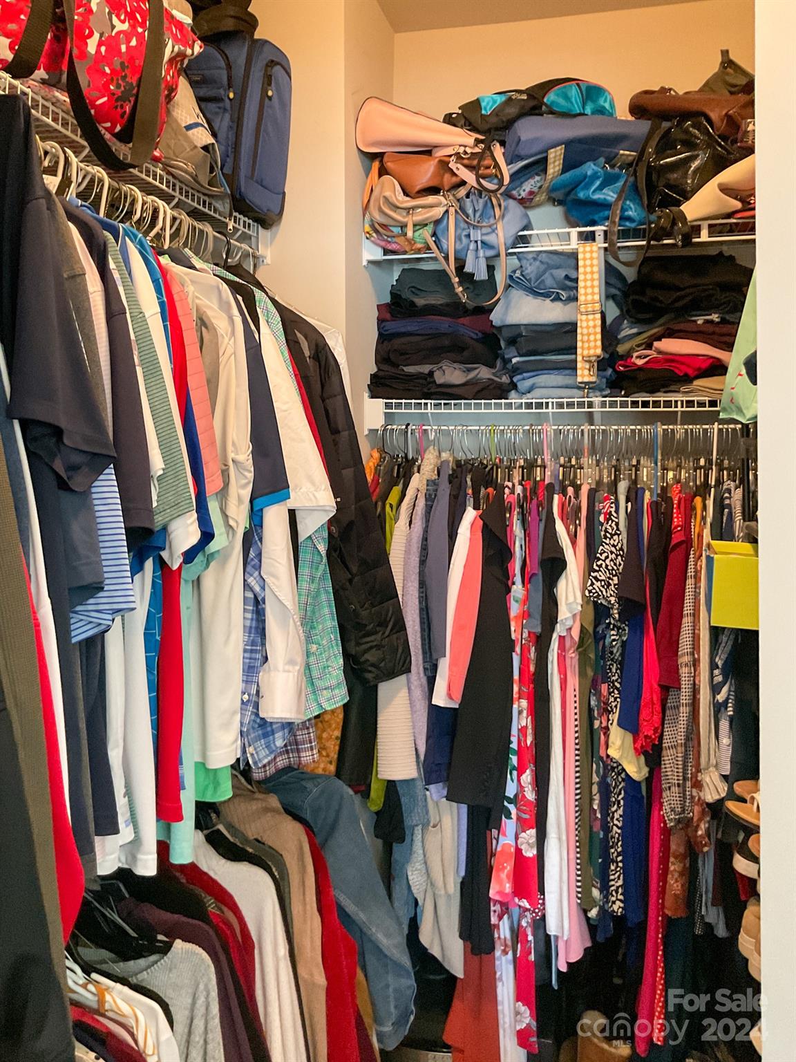 349 Intrepid Court Greer, SC 29650 - Photo 21 of 31 a view of walk in closet with clothes and shoes