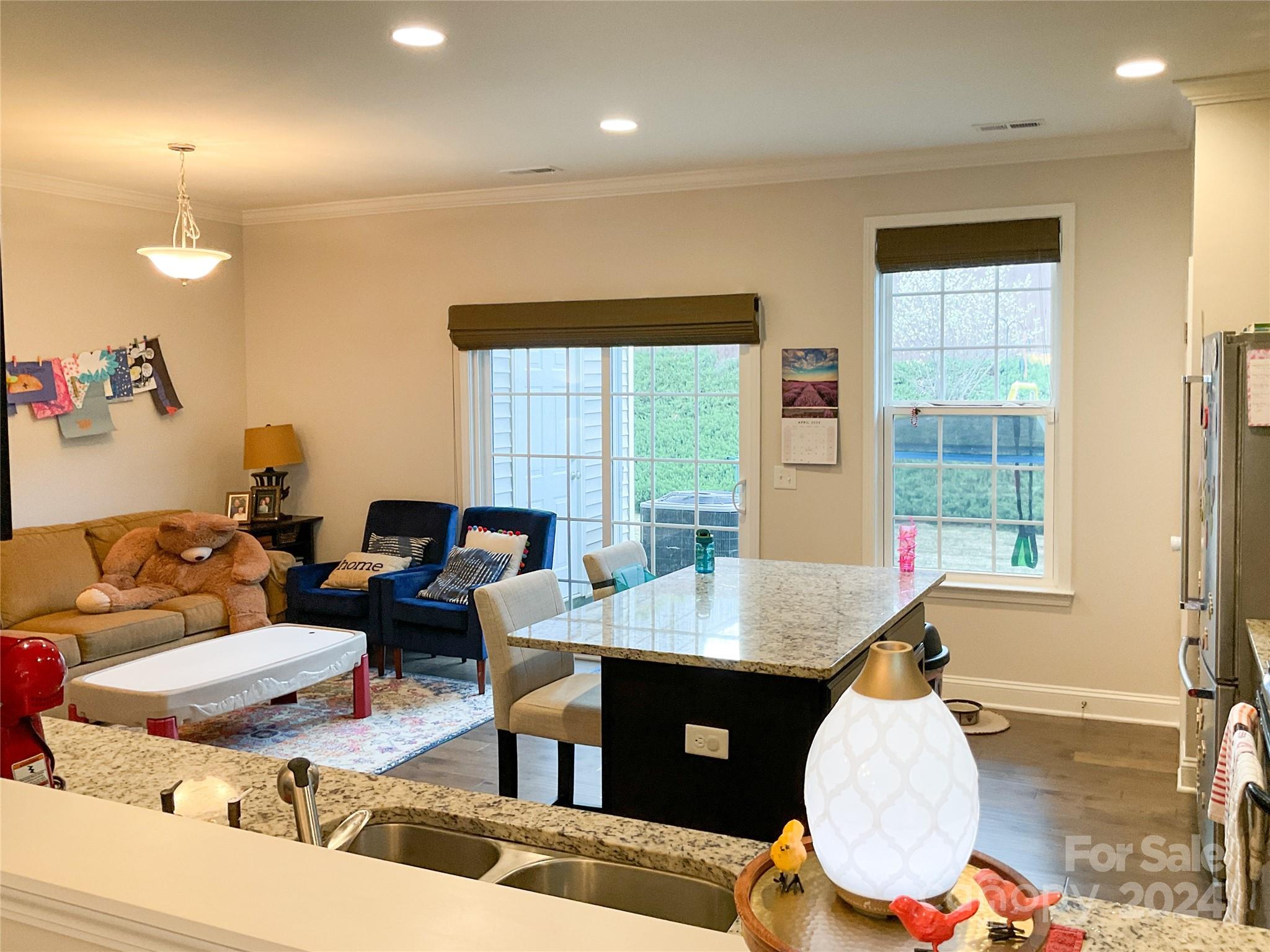 349 Intrepid Court Greer, SC 29650 - Photo 7 of 31 a living room with furniture a large window and a table