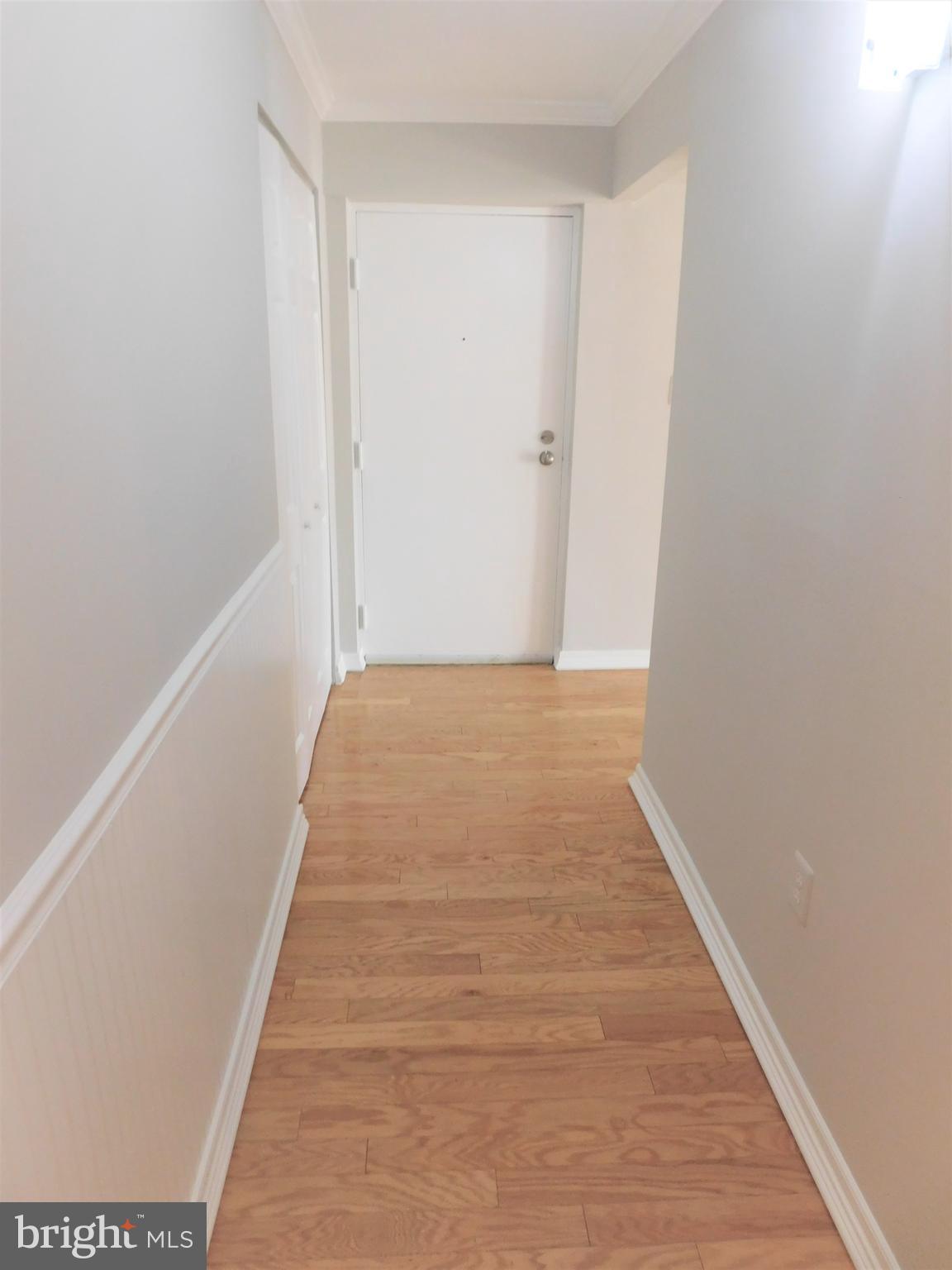 2214 Springwood Drive, Unit T4 Reston, VA 20191 - Photo 3 of 41 Large Foyer with Double Door Coat Closet.