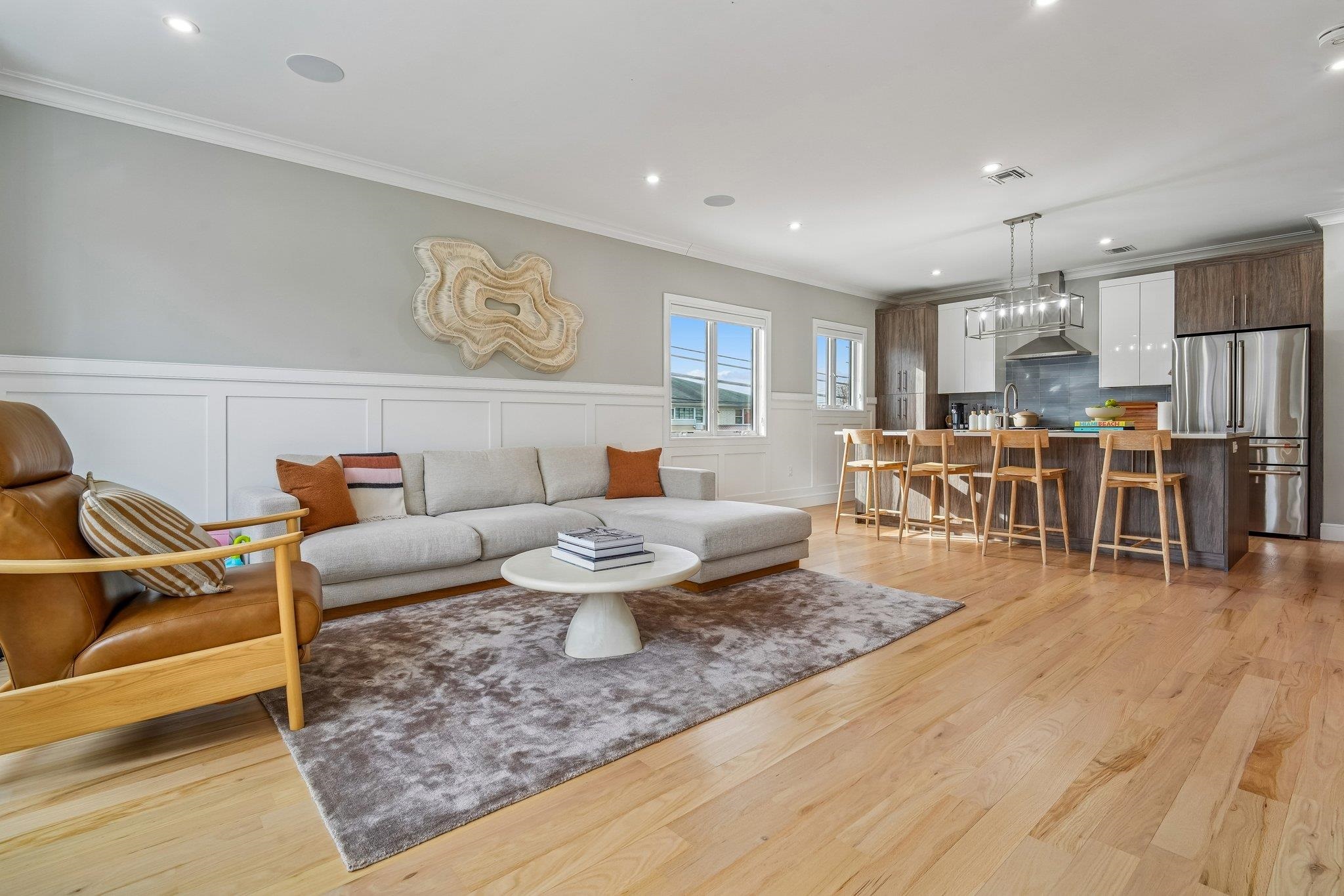 305 8th Street Fairview, NJ 07022 - Photo 6 of 27 a living room with furniture kitchen view and a dining table