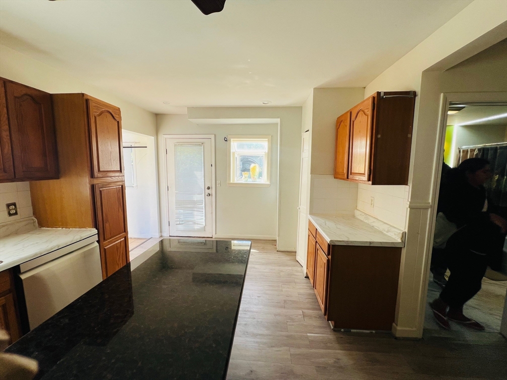 524 Merrimack Street Methuen, MA 01844 - Photo 13 of 34 a view of hallway with washer and dryer