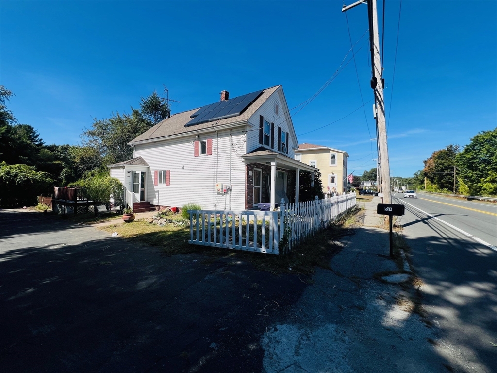 524 Merrimack Street Methuen, MA 01844 - Photo 2 of 34 a view of a house with backyard and sitting area