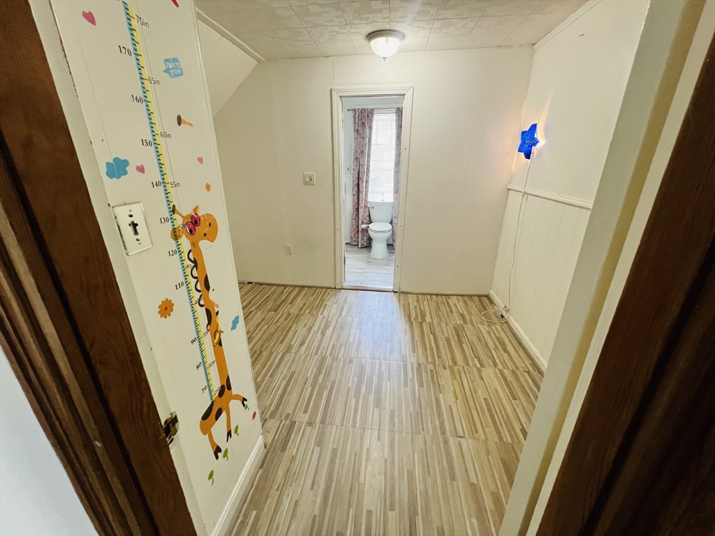 524 Merrimack Street Methuen, MA 01844 - Photo 21 of 34 a view of front door with wooden floor