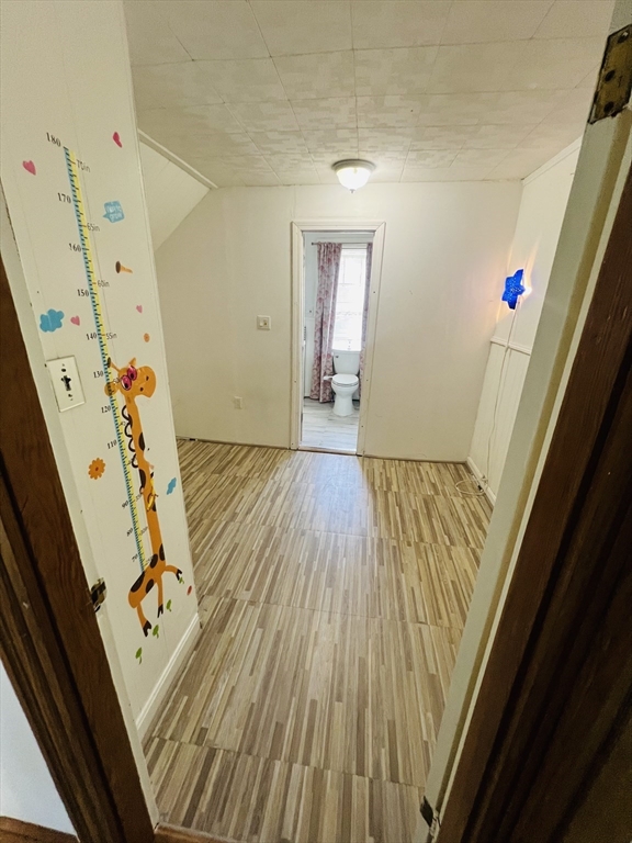 524 Merrimack Street Methuen, MA 01844 - Photo 22 of 34 a view of an entryway with wooden floor