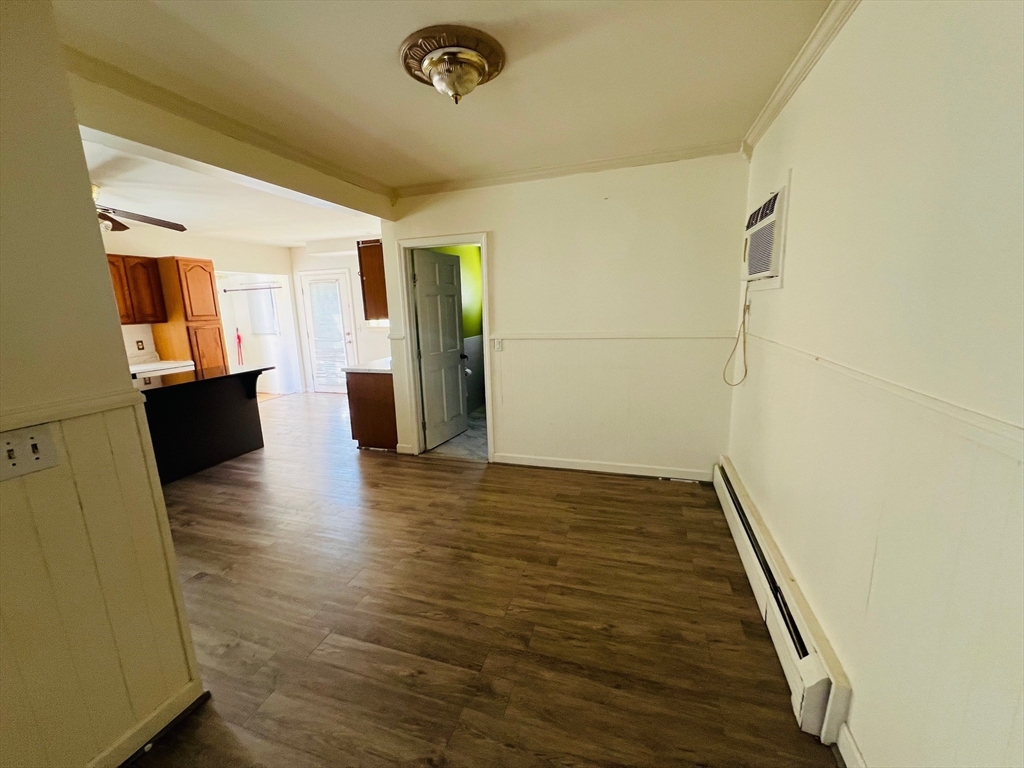 524 Merrimack Street Methuen, MA 01844 - Photo 27 of 34 a view of a livingroom with wooden floor