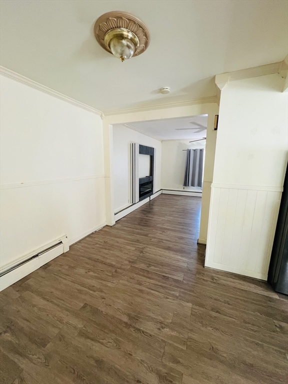 524 Merrimack Street Methuen, MA 01844 - Photo 32 of 34 a view of a livingroom with wooden floor