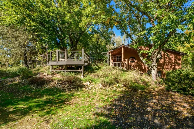 a backyard of a house with lots of green space