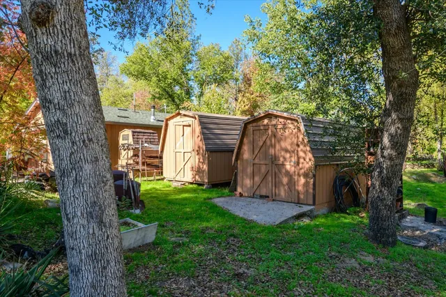 a view of lake background with trees
