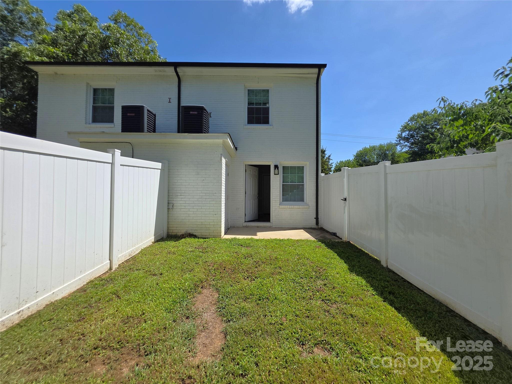 403 Spring Street Northwest Concord, NC 28025 - Photo 16 of 17 front view of a house with a yard