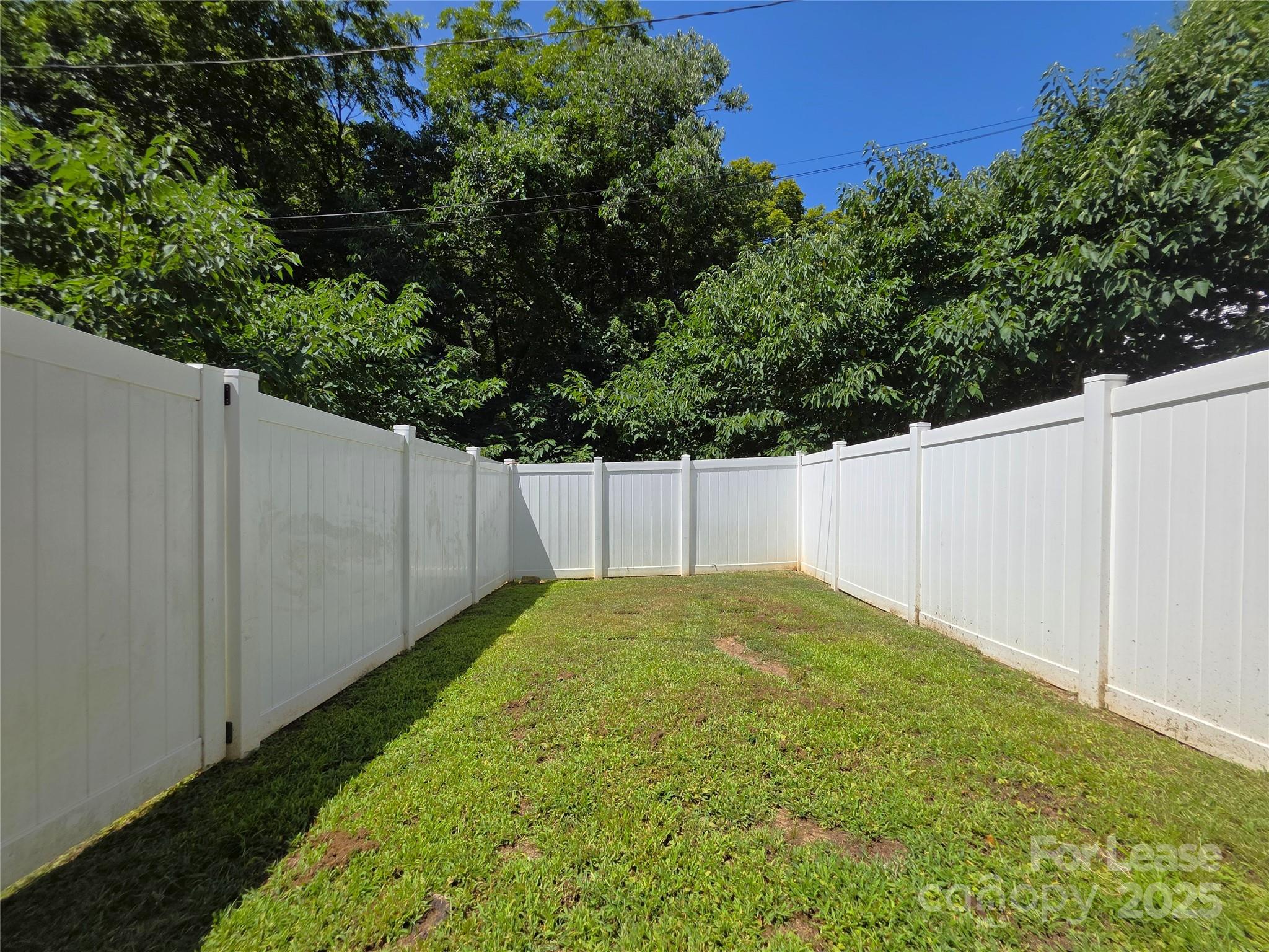403 Spring Street Northwest Concord, NC 28025 - Photo 17 of 17 a view of backyard with green space