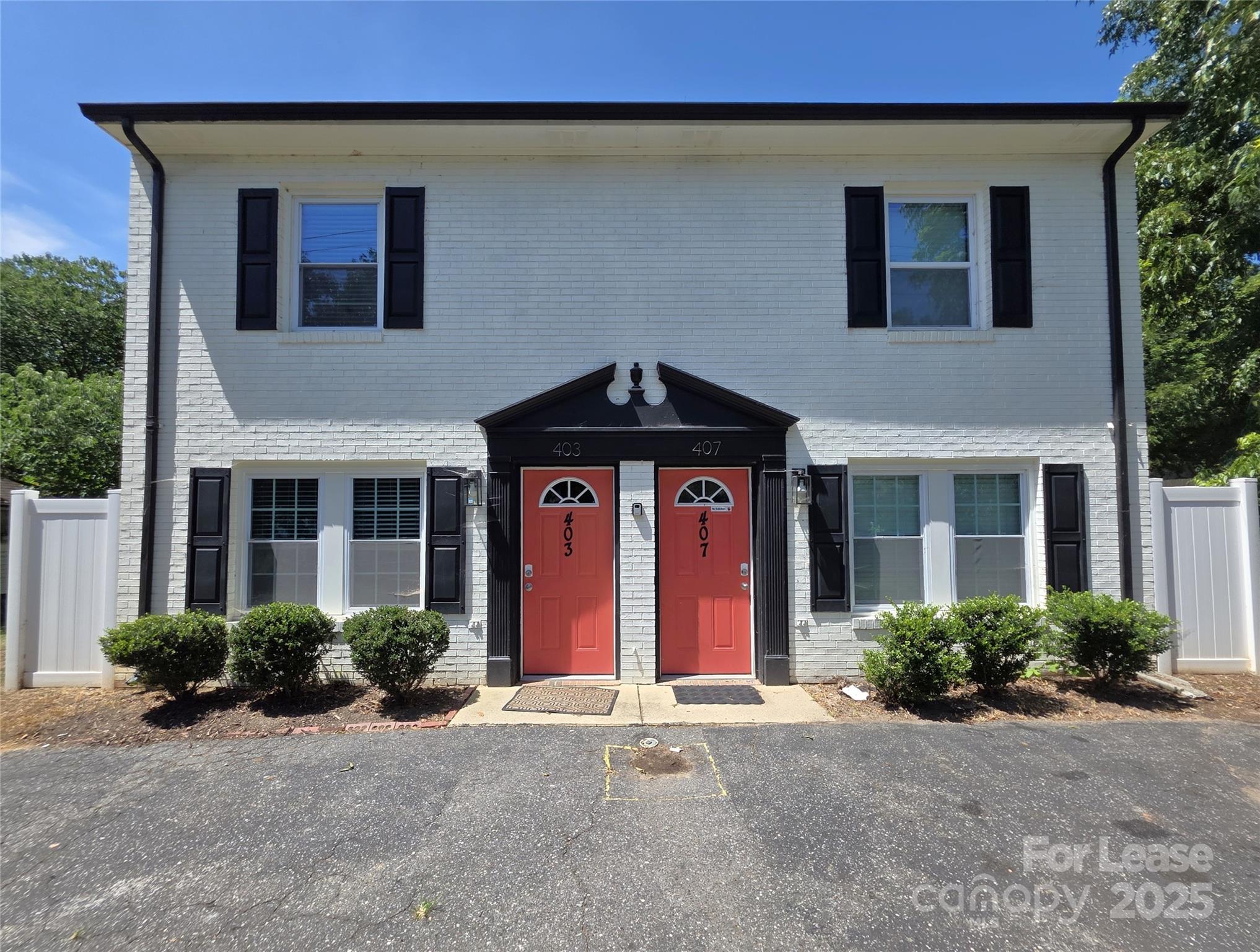 403 Spring Street Northwest Concord, NC 28025 - Photo 2 of 17 a front view of a house with yard